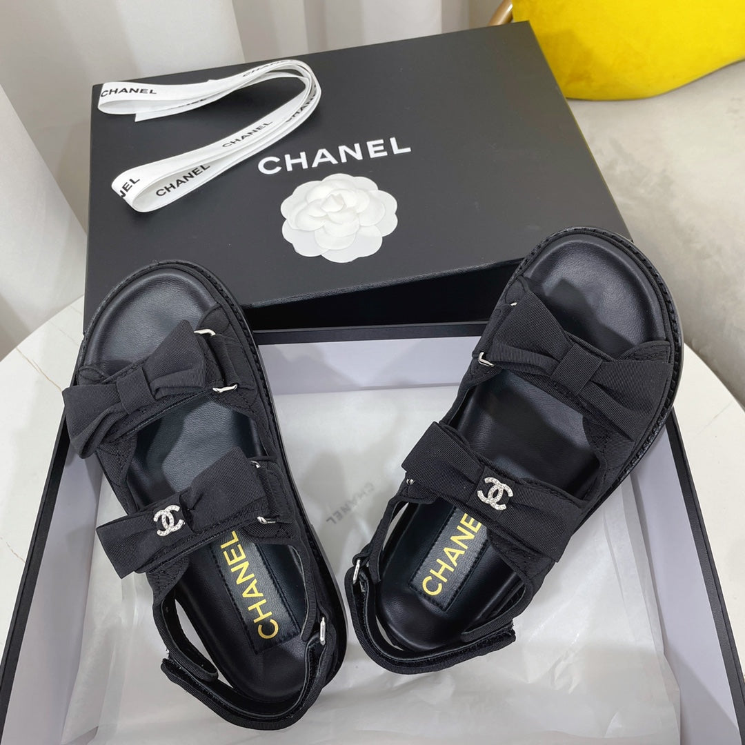 CHANEL 26S SANDALS IN BLACK FABRIC BOW EMBELLISHMENT
