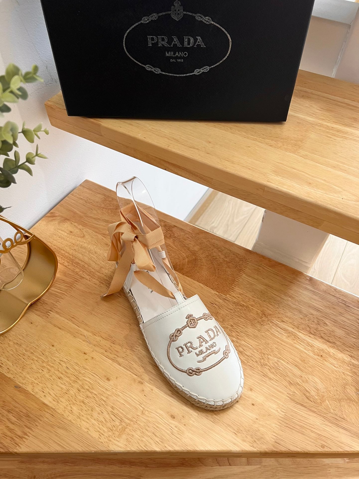 PRADA 26S LACE UP ESPADRILLE FLATS IN CREAM WHITE CALFSKIN