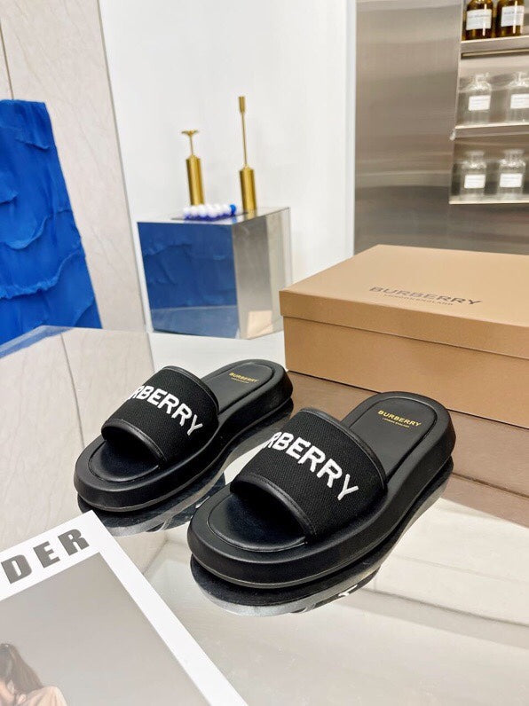 BURBERRY 26S SLIDE SANDALS IN BLACK CALFSKIN AND FABRIC