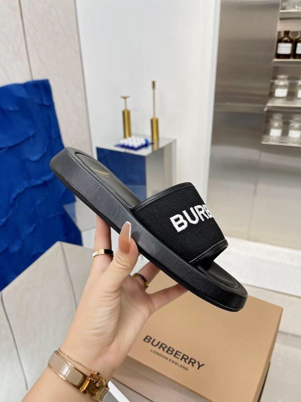 BURBERRY 26S SLIDE SANDALS IN BLACK CALFSKIN AND FABRIC
