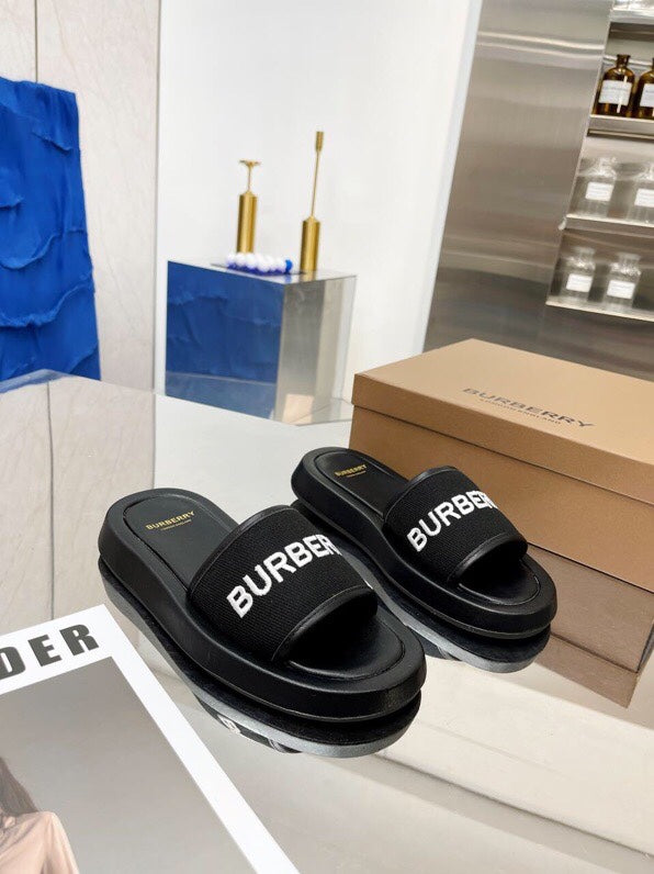 BURBERRY 26S SLIDE SANDALS IN BLACK CALFSKIN AND FABRIC