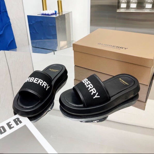 BURBERRY 26S SLIDE SANDALS IN BLACK CALFSKIN AND FABRIC