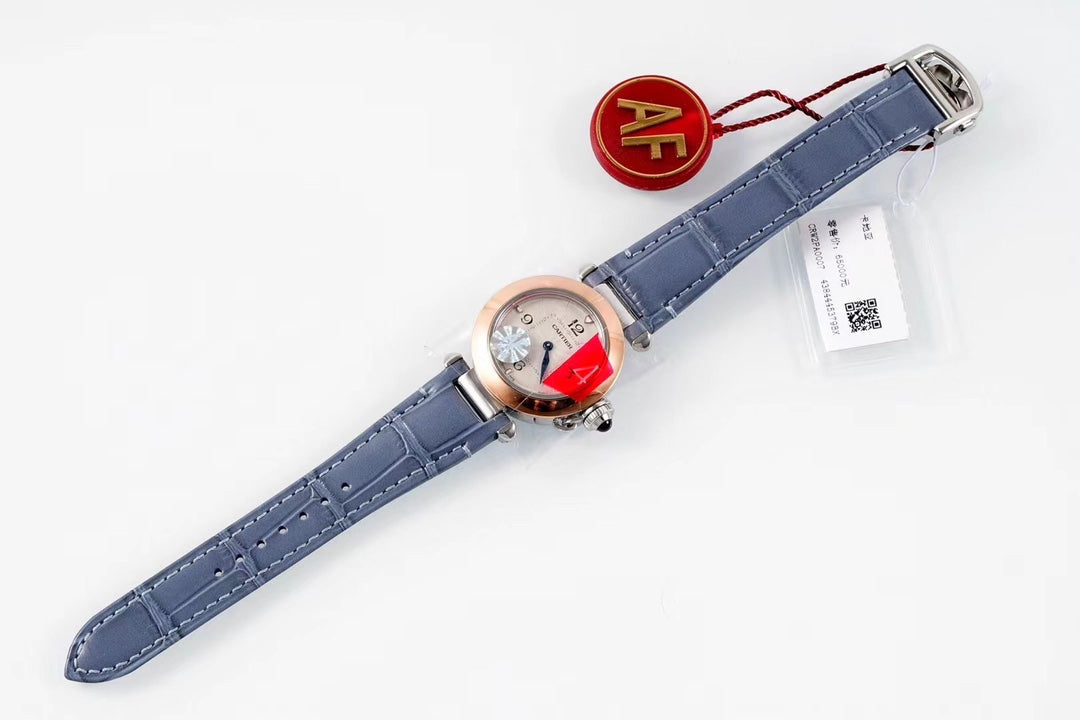 PASHA DE CARTIER WATCH ROSE GOLD AND SILVER CASE AND STONE BLUE LEATHER STRAP