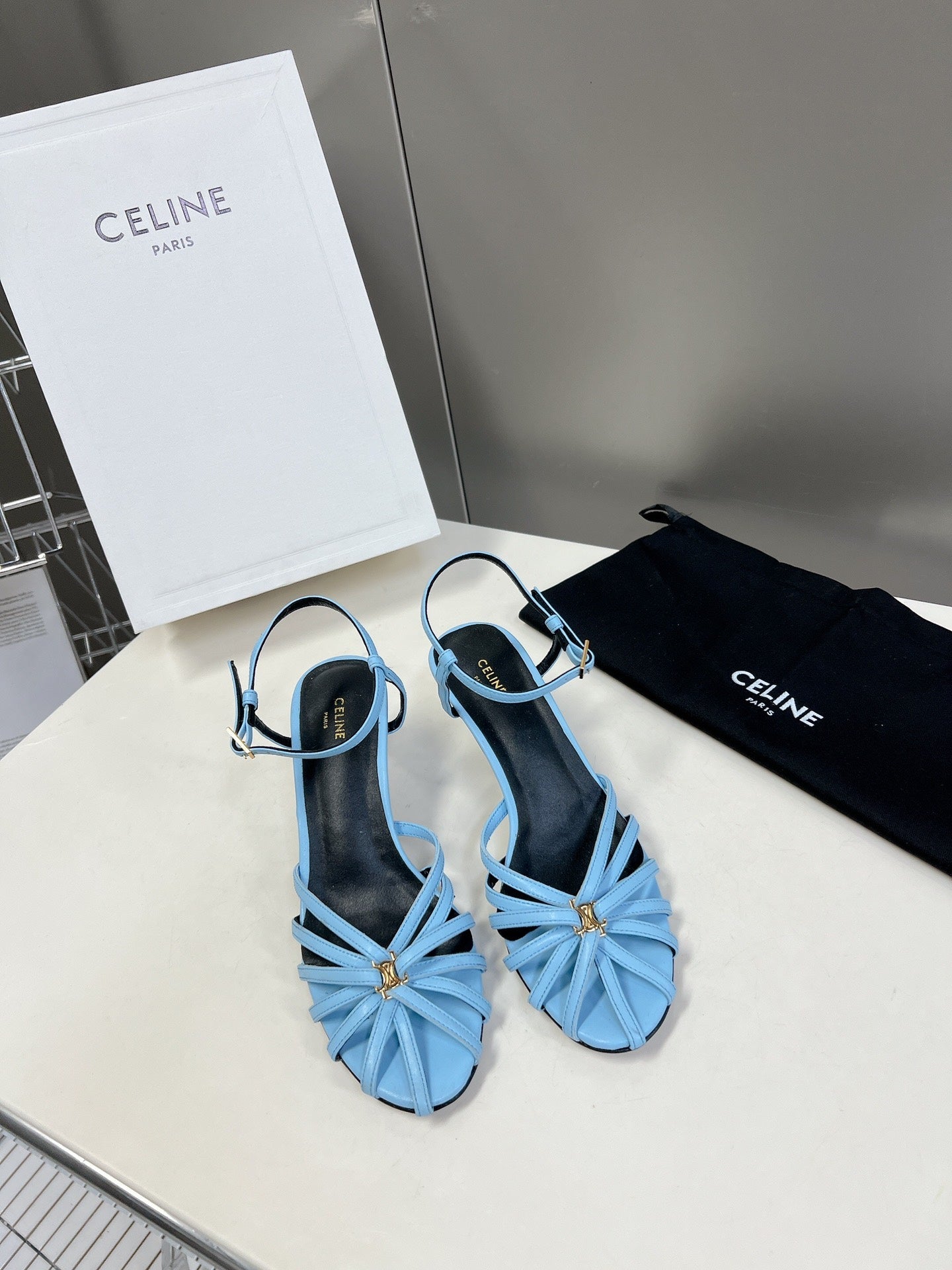 CELINE 26S KNOT STRAPPY SANDALS 60MM IN SKY BLUE CALFSKIN