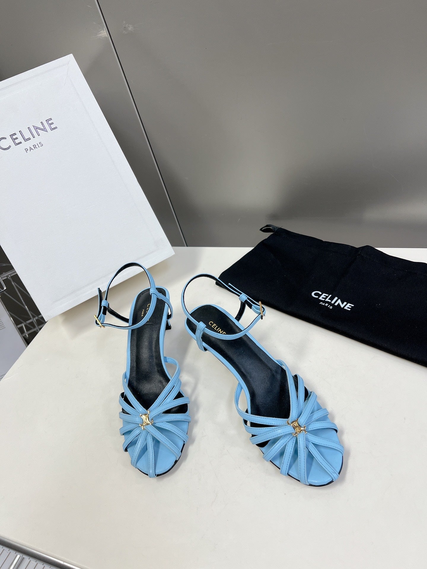 CELINE 26S KNOT STRAPPY SANDALS 60MM IN SKY BLUE CALFSKIN