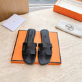 0RAN SANDAL IN BLACK CALFSKIN 202622
