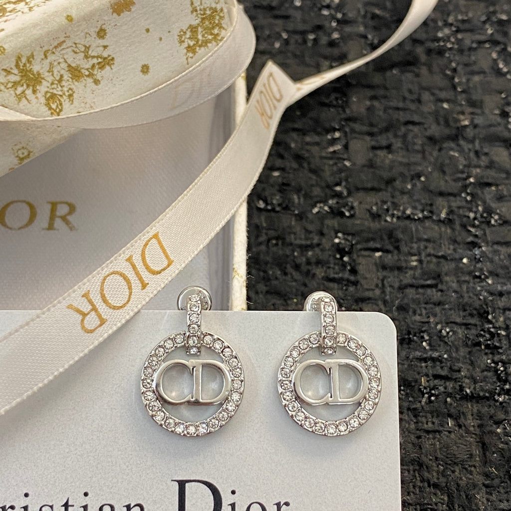 CD 26S CRYSTAL CIRCLE LOGO DROP EARRINGS IN SILVER TONE METAL 644469