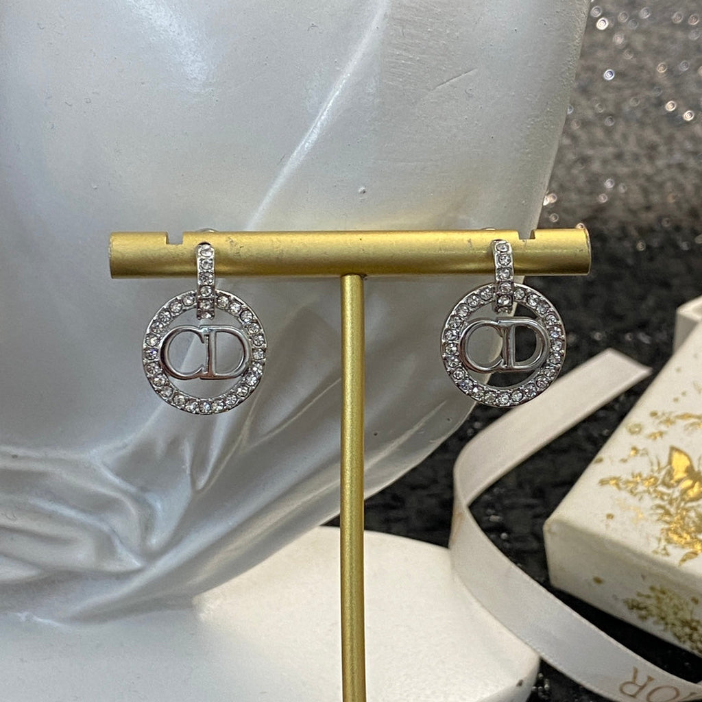 CD 26S CRYSTAL CIRCLE LOGO DROP EARRINGS IN SILVER TONE METAL 644469