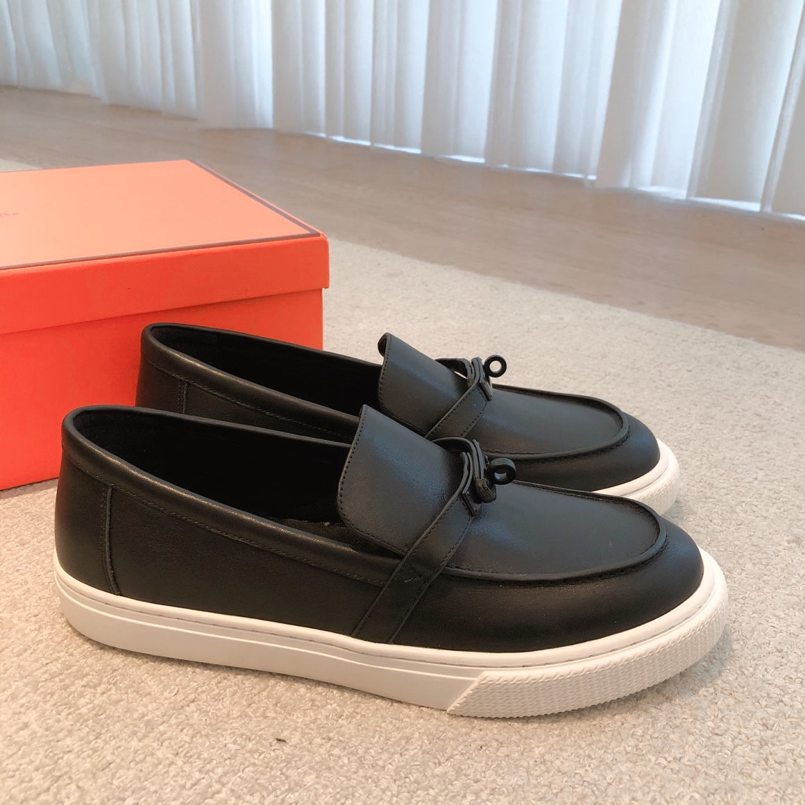 HM GAME SLIP-ON SNEAKER BLACK AND WHITE CALFSKIN
