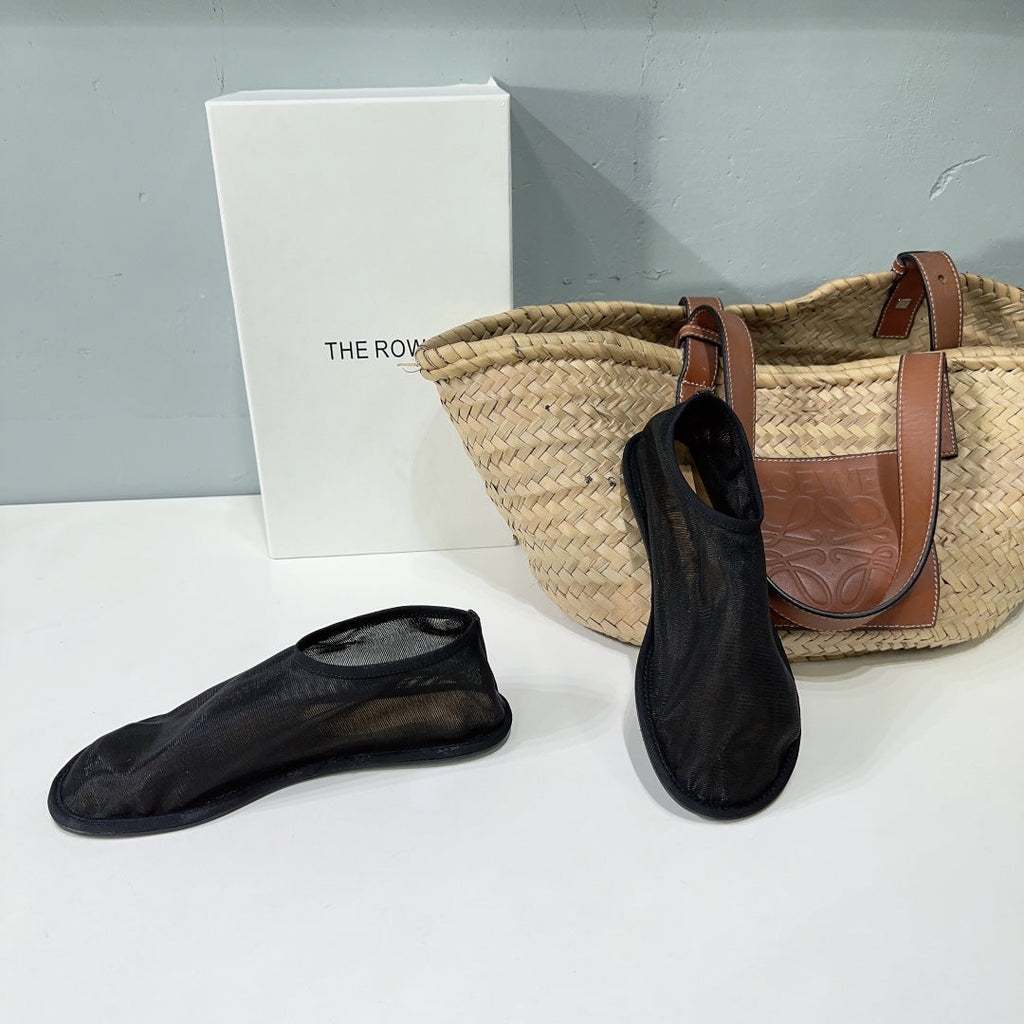 THE ROW 26S SOCK FLATS IN BLACK MESH
