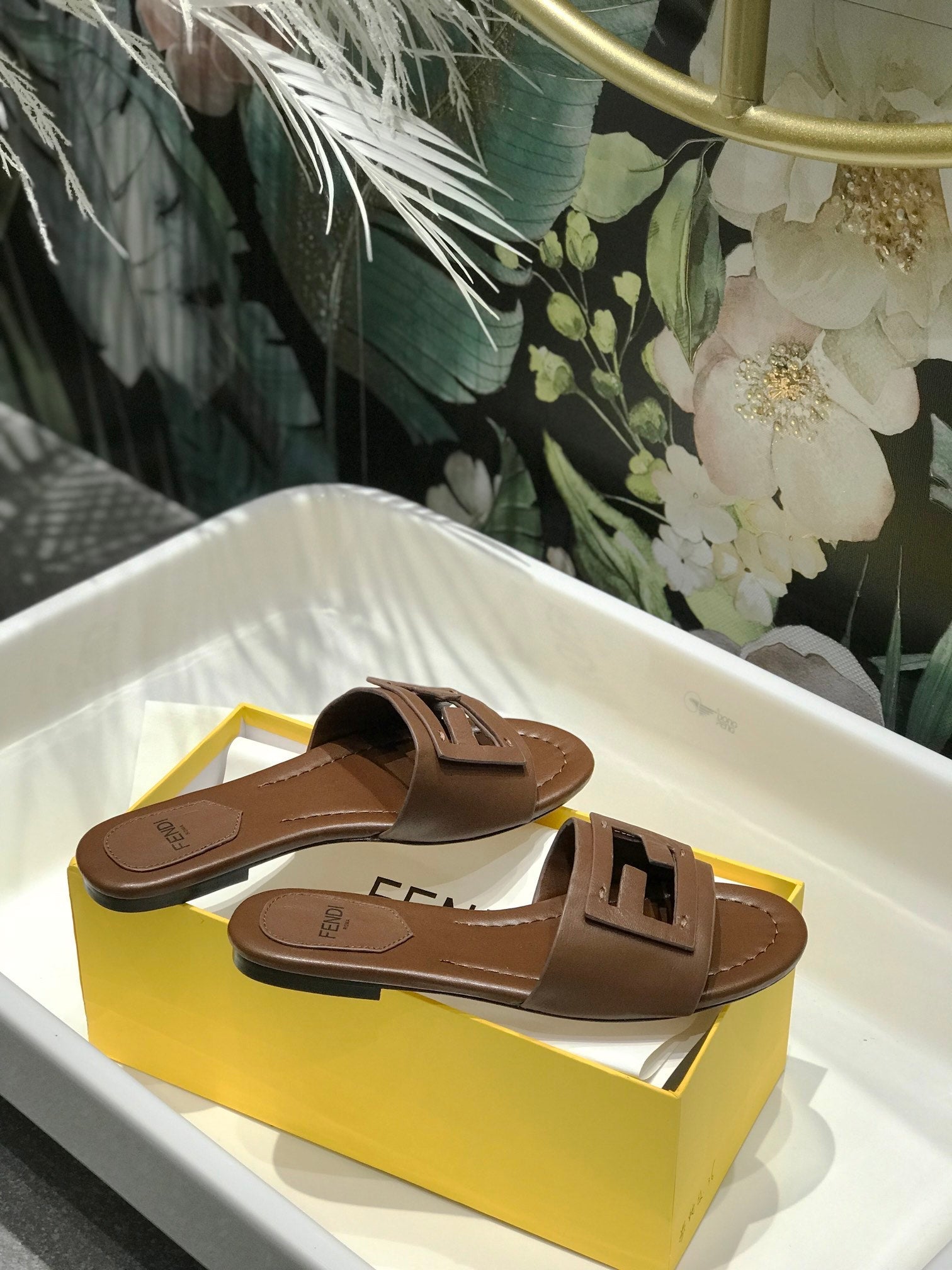 FENDI BAGUETTE SLIDES IN COFFEE BROWN LAMBSKIN