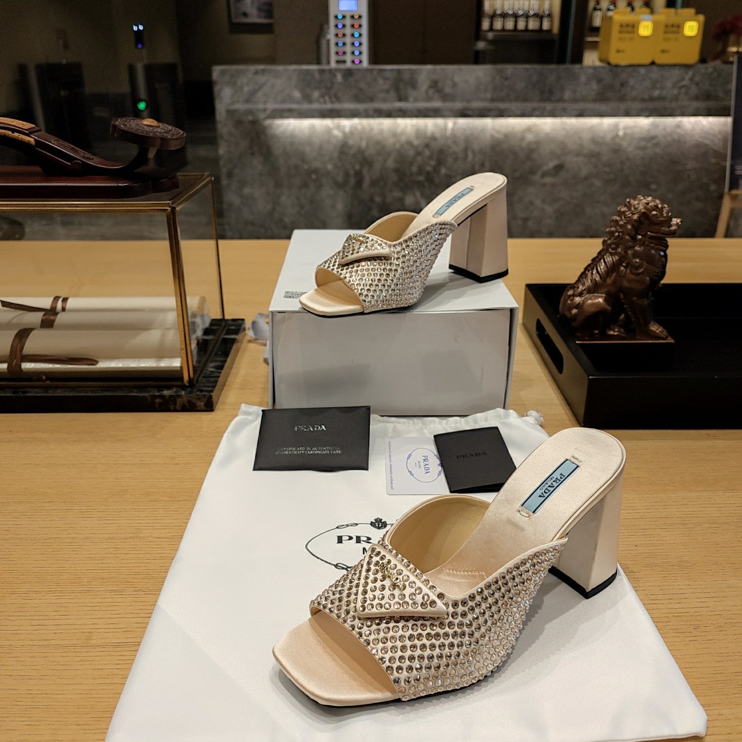 PRADA 26S OPEN TOE CRYSTAL EMBELLISHED MULES 100MM IN BEIGE SATIN