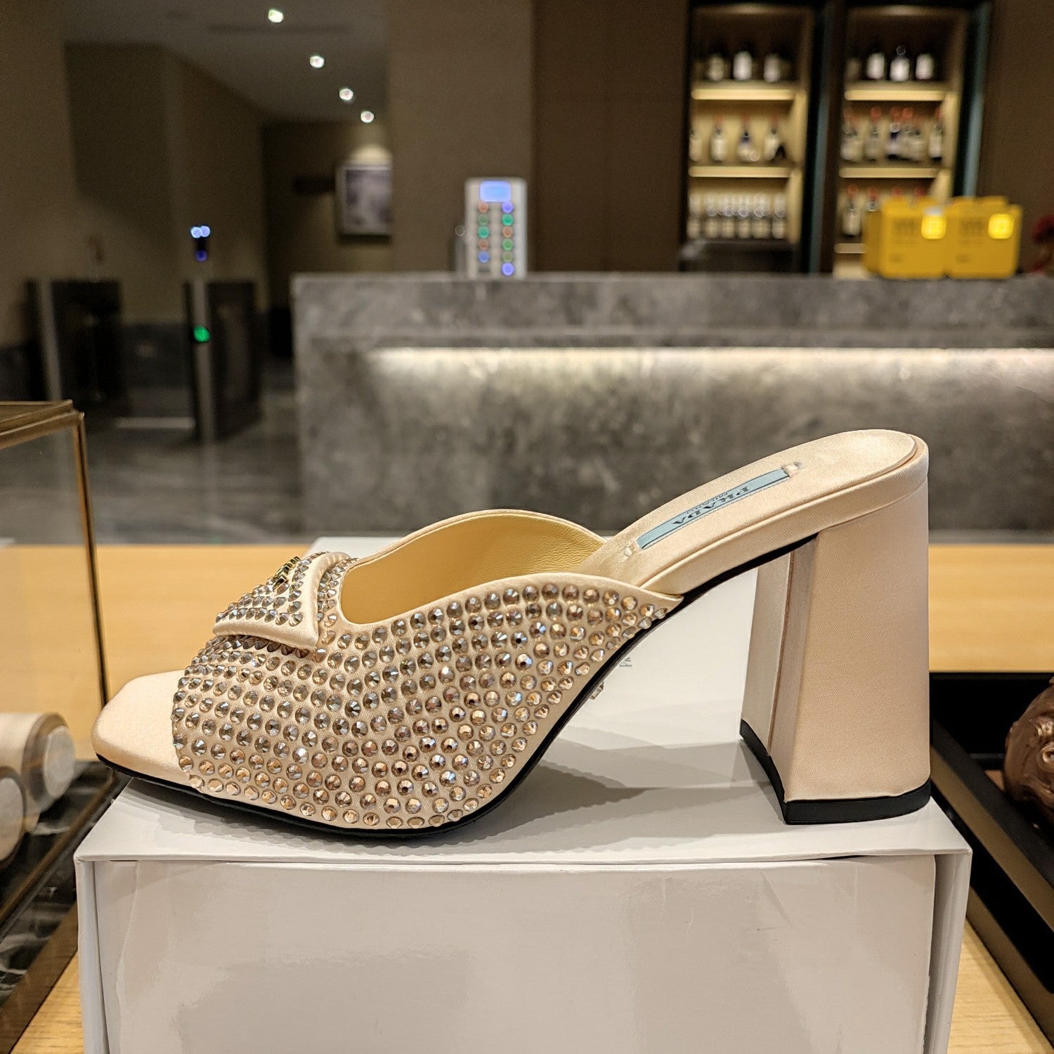 PRADA 26S OPEN TOE CRYSTAL EMBELLISHED MULES 100MM IN BEIGE SATIN