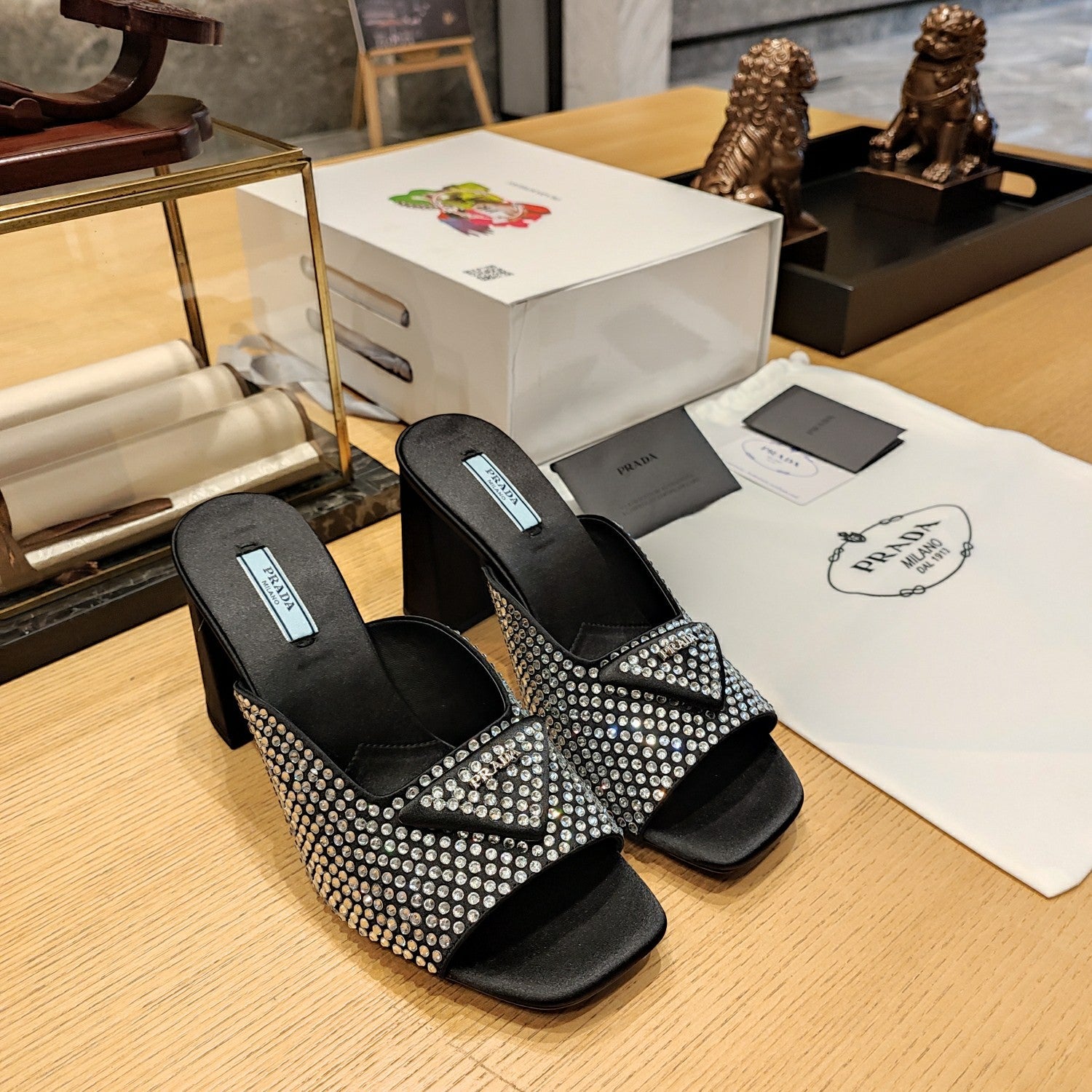 PRADA 26S OPEN TOE CRYSTAL EMBELLISHED MULES 100MM IN BLACK SATIN