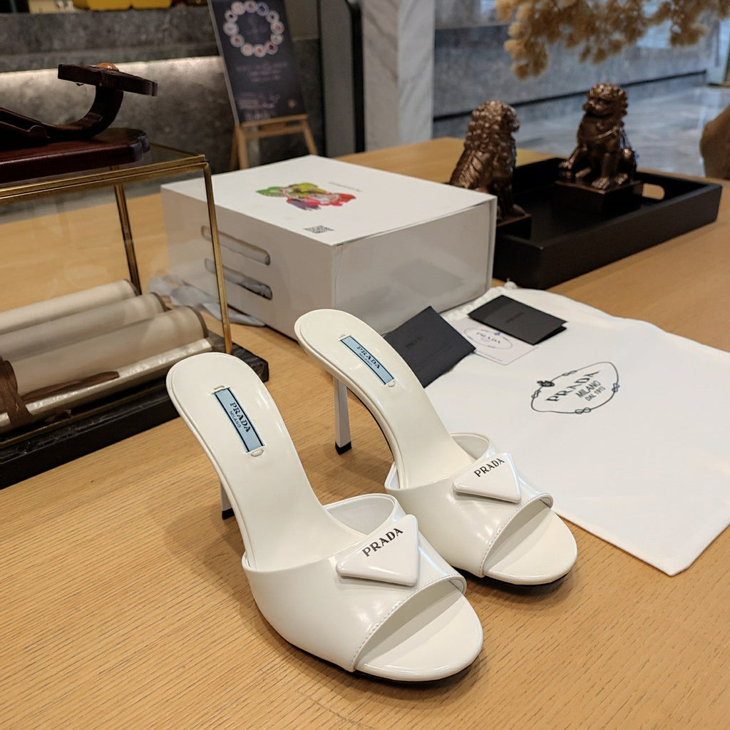 PRADA 26S OPEN TOE MULES 100MM IN IVORY WHITE PATENT CALFSKIN WITH LOGO