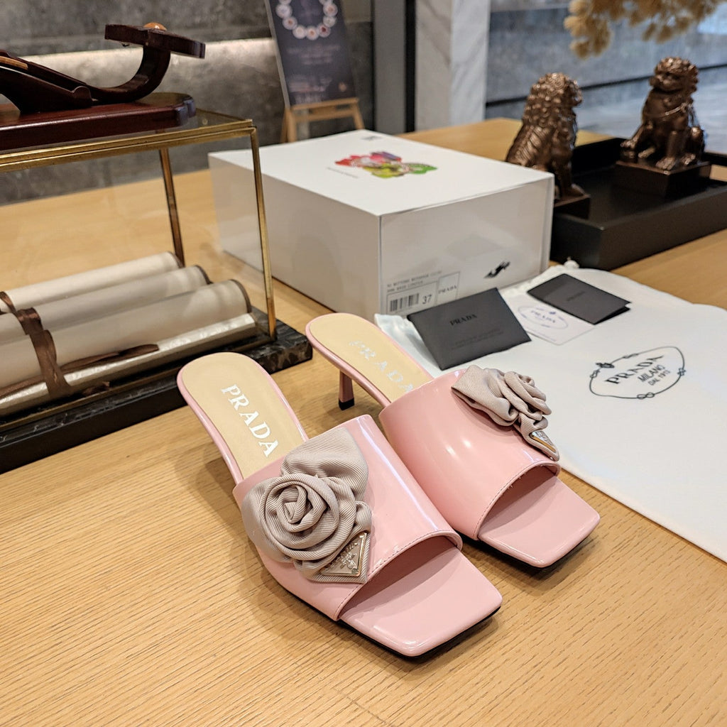 PRADA 26S OPEN TOE MULES 45MM IN BLUSH PINK PATENT CALFSKIN WITH ROSETTE