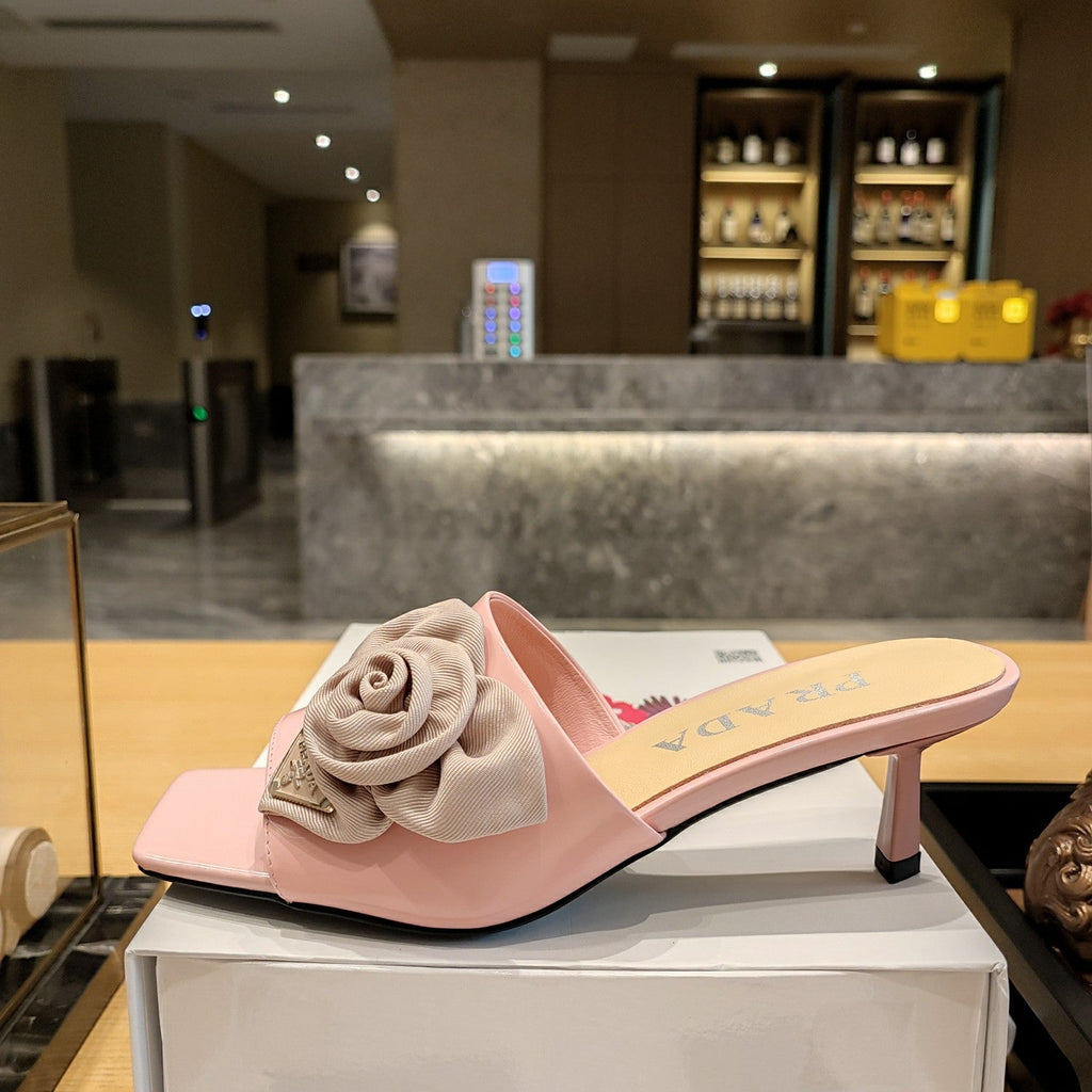 PRADA 26S OPEN TOE MULES 45MM IN BLUSH PINK PATENT CALFSKIN WITH ROSETTE