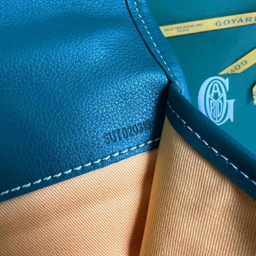 SAINT LÉGER BACKPACK 35 IN GREEN GOYARDINE CANVAS AND CALFSKIN WITH CARTOON PATCH