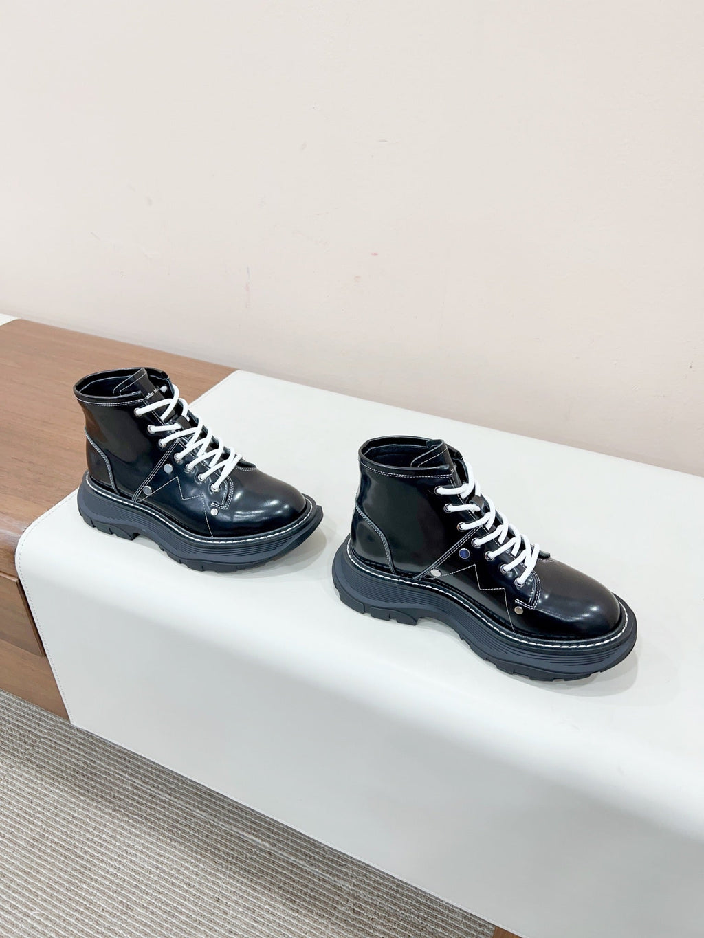 MCQUEEN LEATHER ANKLE BOOT IN BLACK MIX WHITE LAMBSKIN