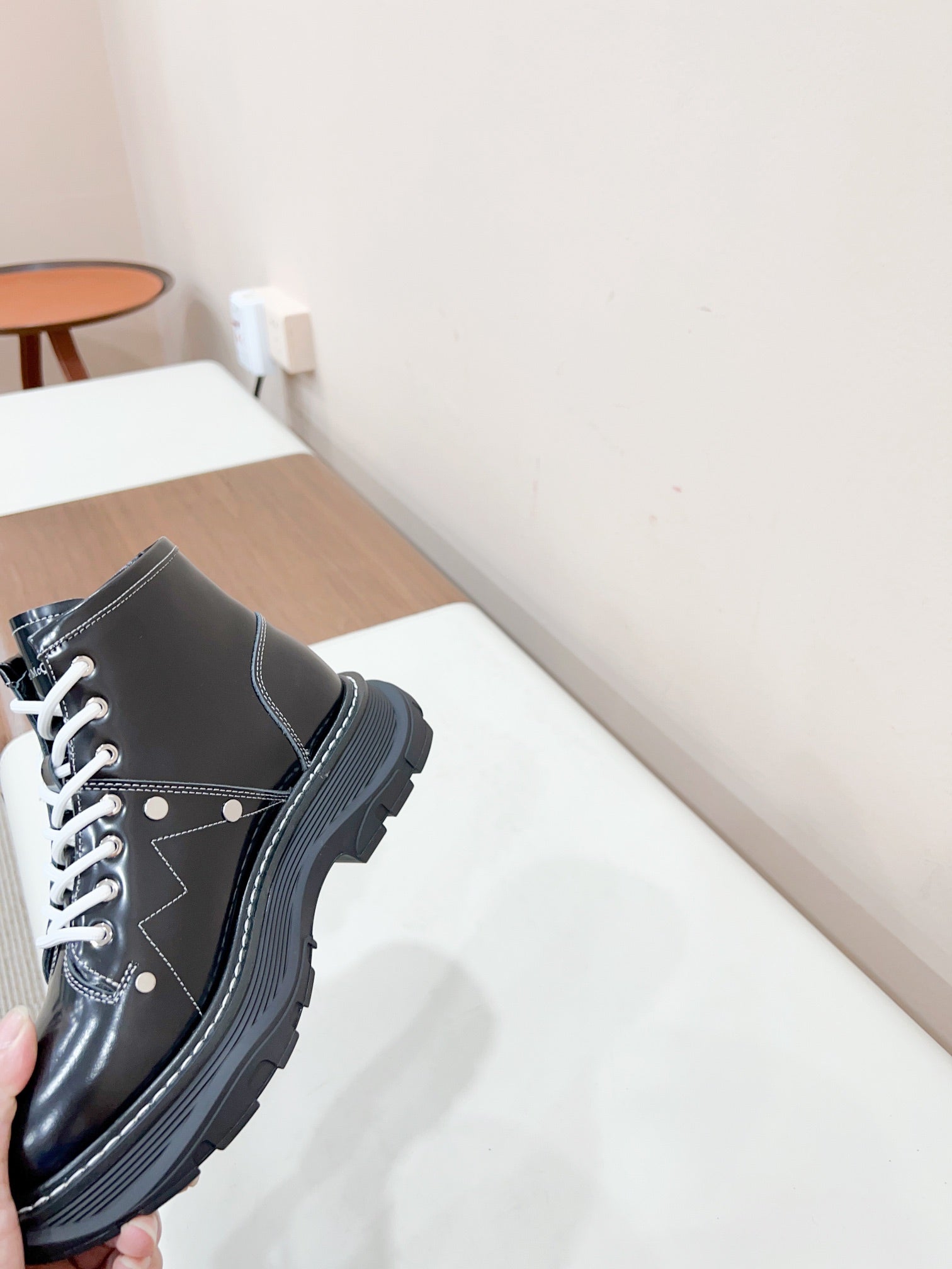 MCQUEEN LEATHER ANKLE BOOT IN BLACK MIX WHITE LAMBSKIN