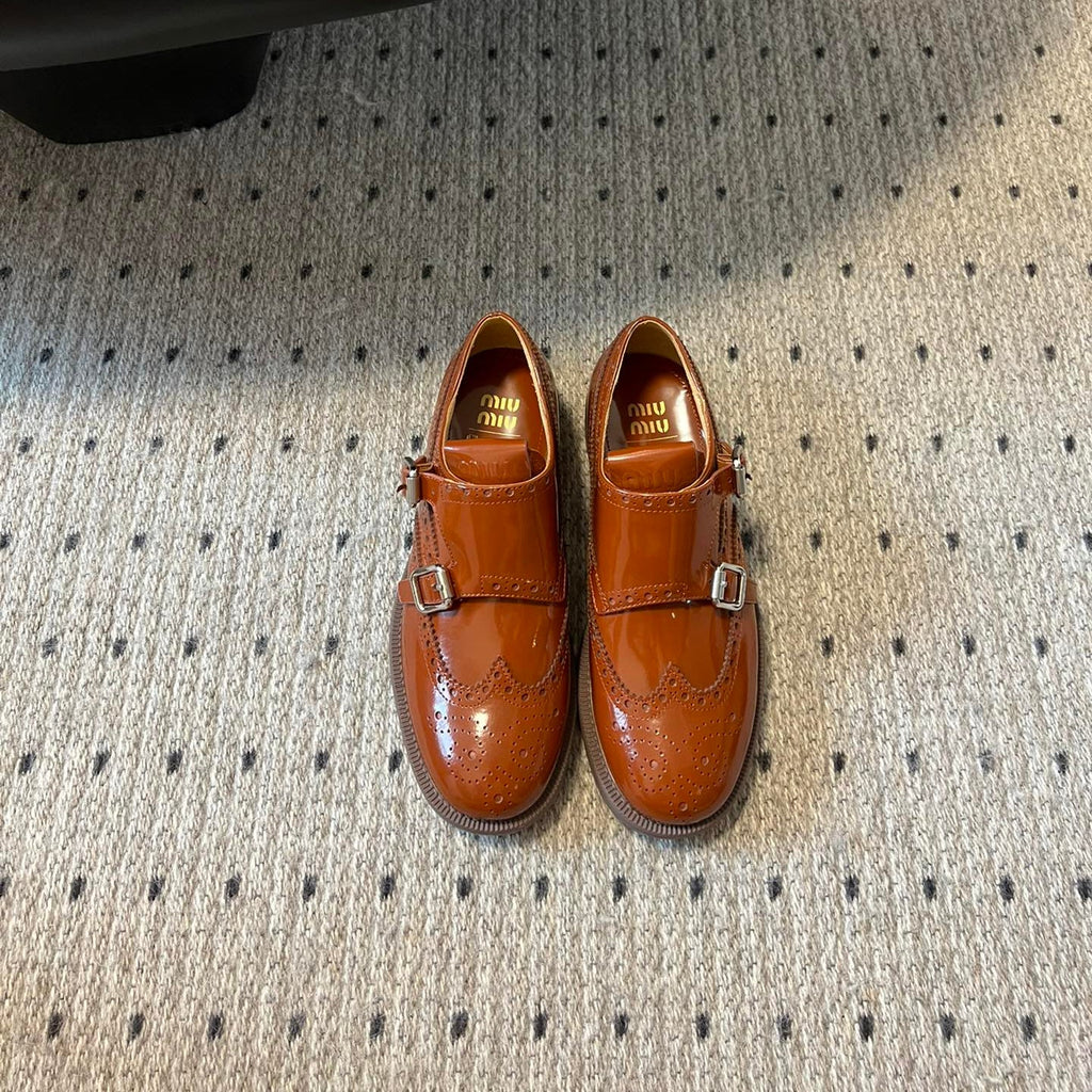 MIUMIU 26S CHURCH BROGUE MONK STRAP SHOES IN RUST ORANGE PATENT CALFSKIN