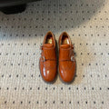 MIUMIU 26S CHURCH BROGUE MONK STRAP SHOES IN RUST ORANGE PATENT CALFSKIN