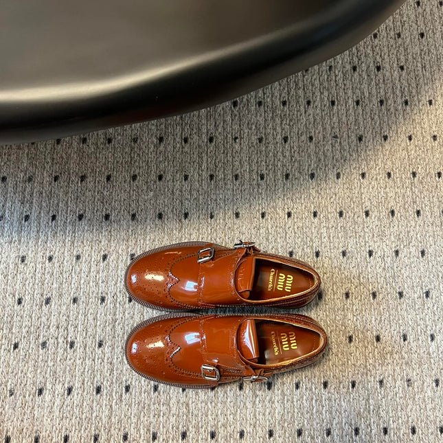 MIUMIU 26S CHURCH BROGUE MONK STRAP SHOES IN RUST ORANGE PATENT CALFSKIN