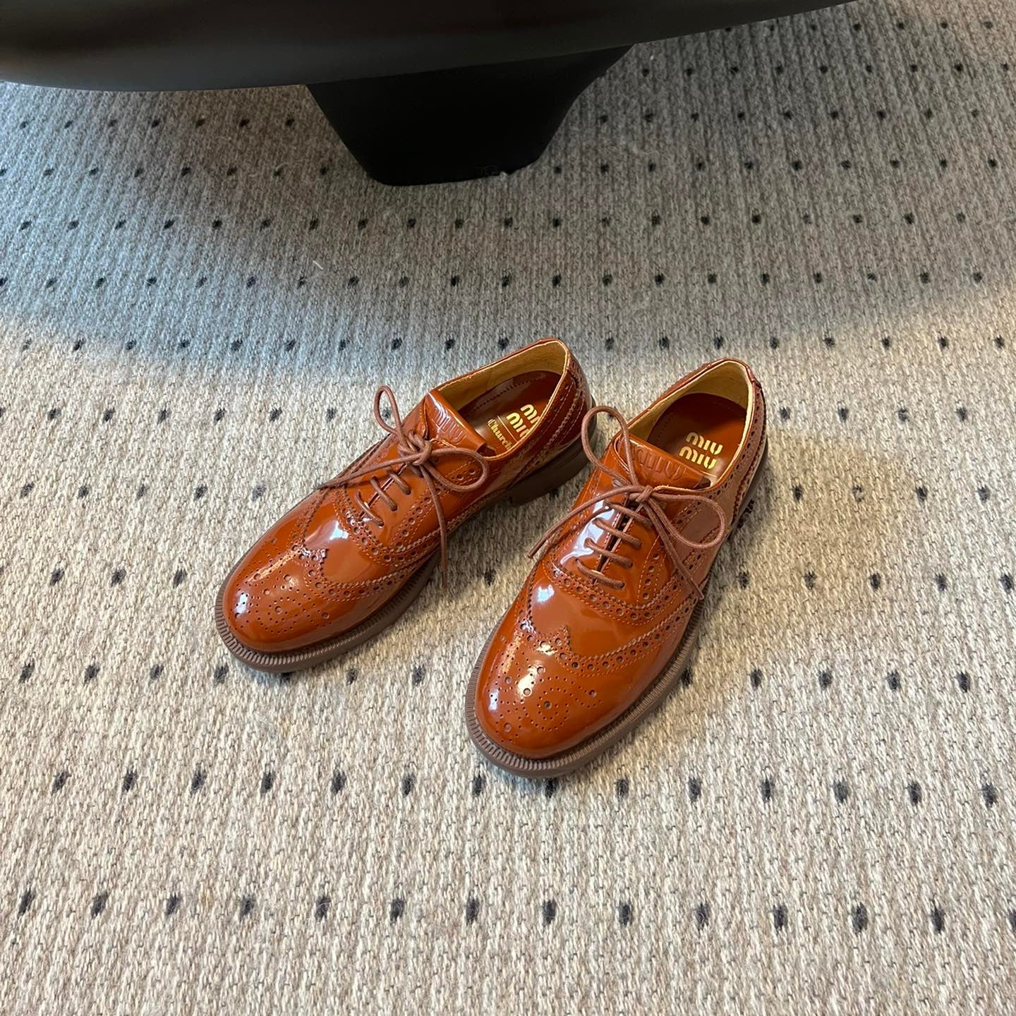 MIUMIU 26S LACE-UP BROGUE LOAFERS IN RUST ORANGE PATENT CALFSKIN