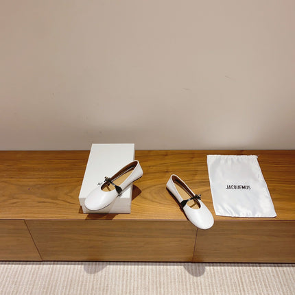 JACQUEMUS 26S MARY JANE FLATS IN WHITE AND BLACK CALFSKIN
