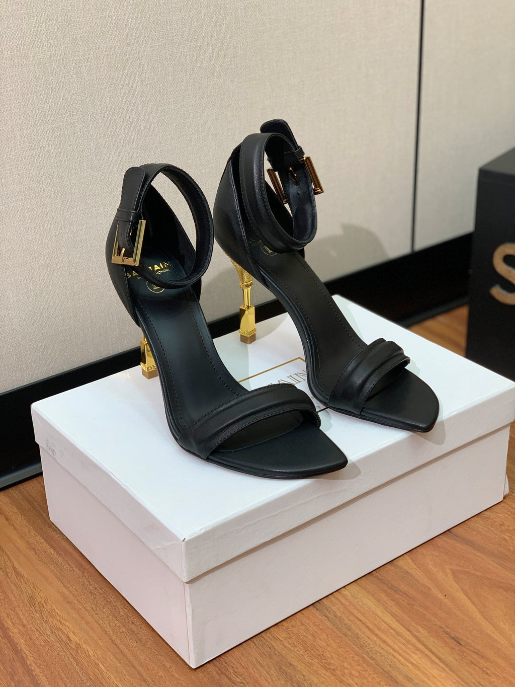 BALMAIN 26S METAL-HEEL SANDALS 105 MM IN BLACK CALFSKIN