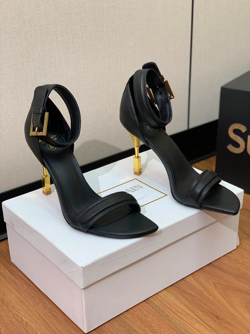 BALMAIN 26S METAL-HEEL SANDALS 105 MM IN BLACK CALFSKIN