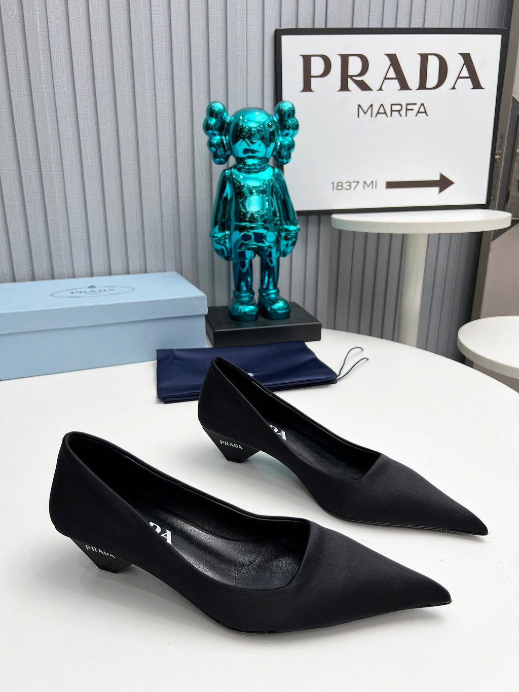 PRADA 26S POINTED TOE PUMPS 40MM IN BLACK SATIN