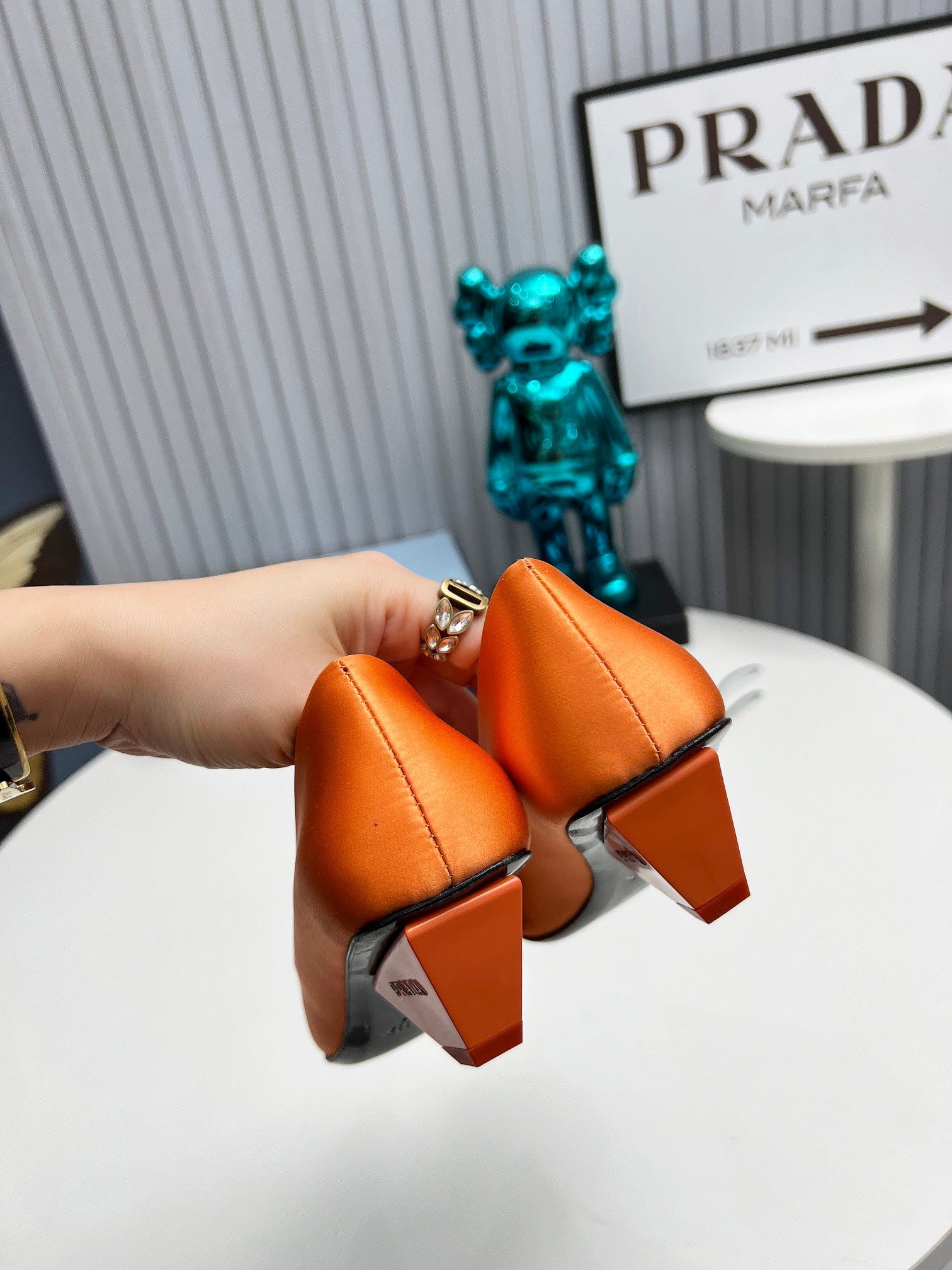 PRADA 26S POINTED TOE PUMPS 40MM IN ORANGE SATIN