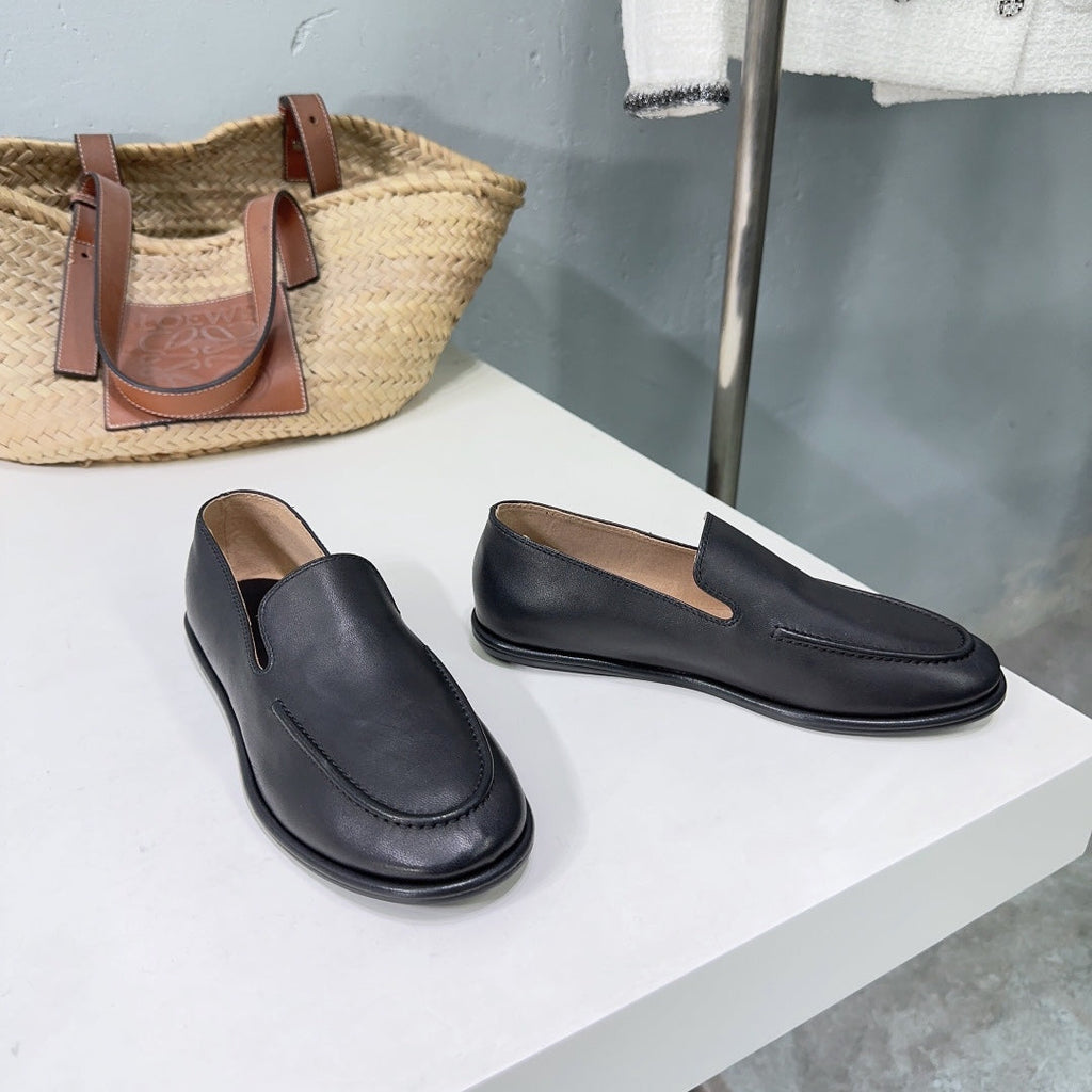 THE ROW 26S CLASSIC LOAFERS IN BLACK CALFSKIN