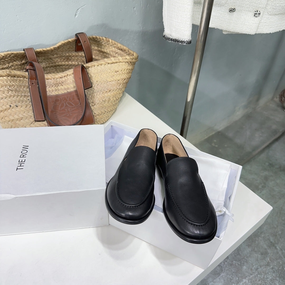 THE ROW 26S CLASSIC LOAFERS IN BLACK CALFSKIN