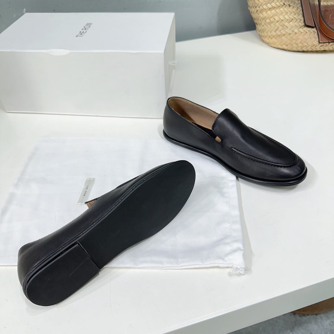 THE ROW 26S CLASSIC LOAFERS IN BLACK CALFSKIN