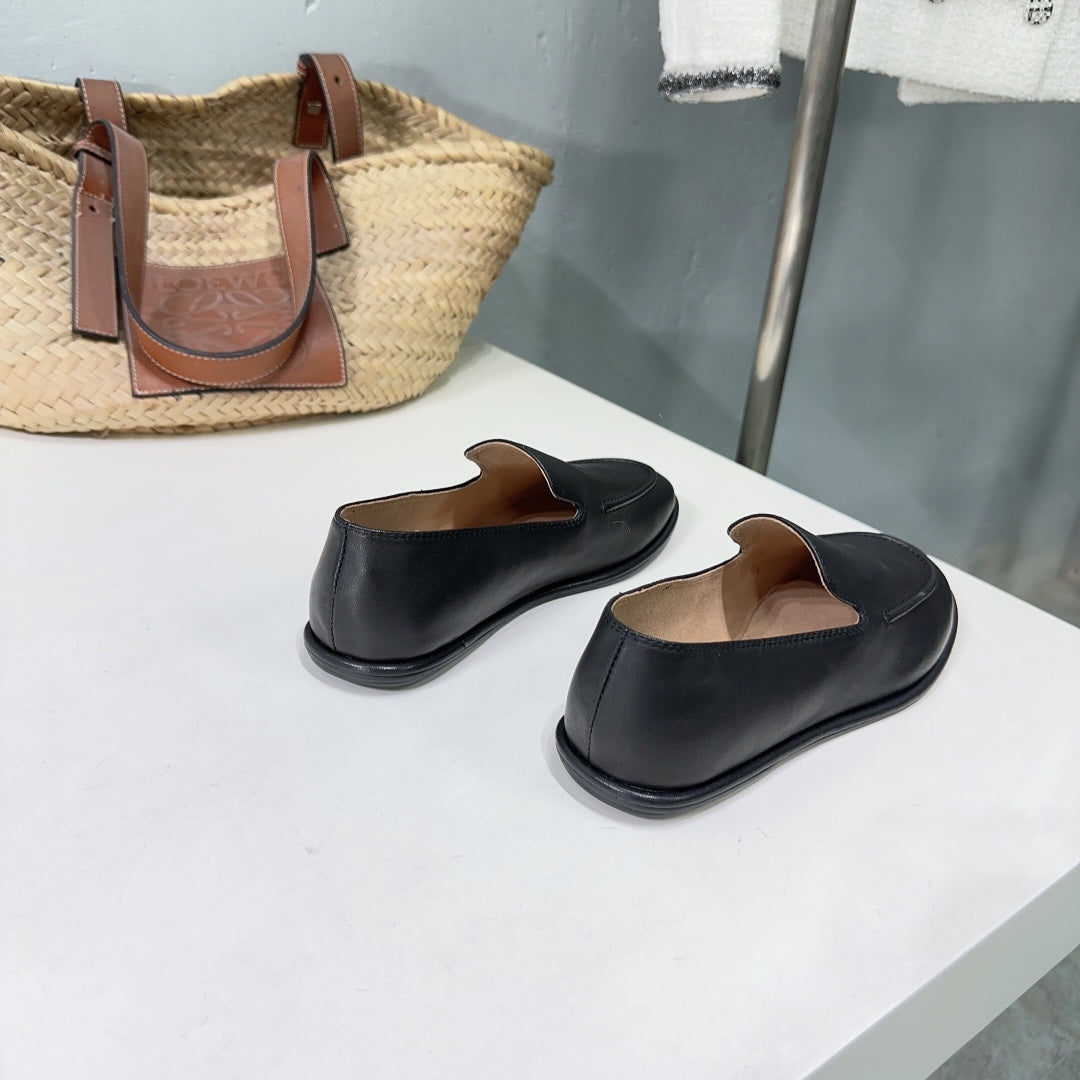 THE ROW 26S CLASSIC LOAFERS IN BLACK CALFSKIN