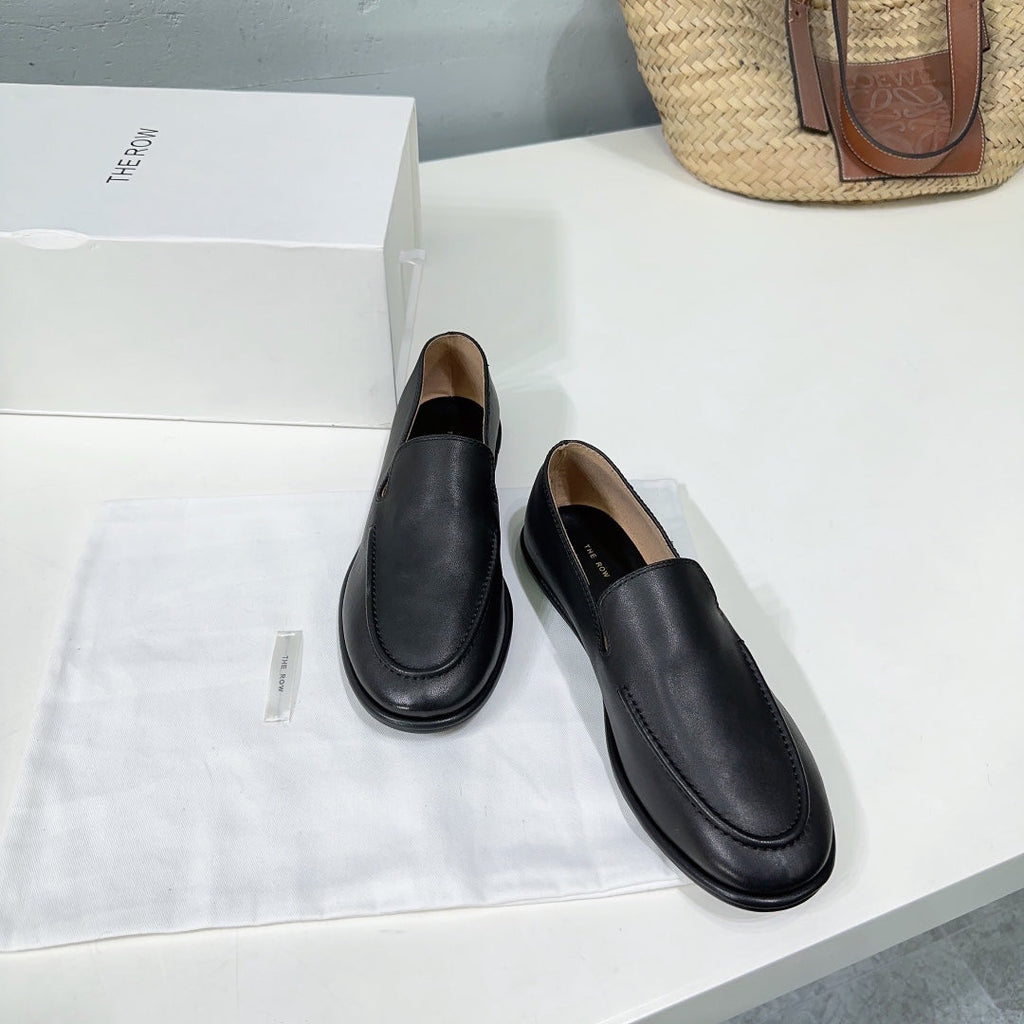 THE ROW 26S CLASSIC LOAFERS IN BLACK CALFSKIN