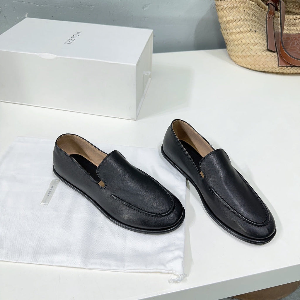 THE ROW 26S CLASSIC LOAFERS IN BLACK CALFSKIN