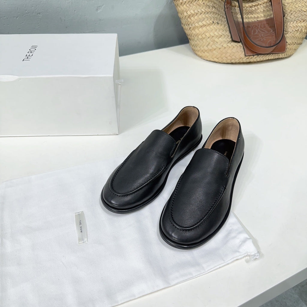 THE ROW 26S CLASSIC LOAFERS IN BLACK CALFSKIN