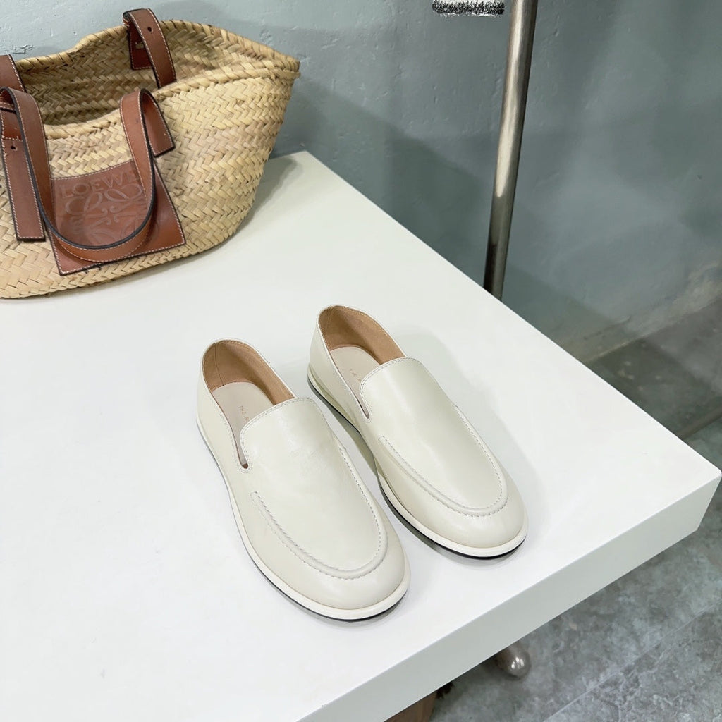 THE ROW 26S CLASSIC LOAFERS IN IVORY WHITE CALFSKIN