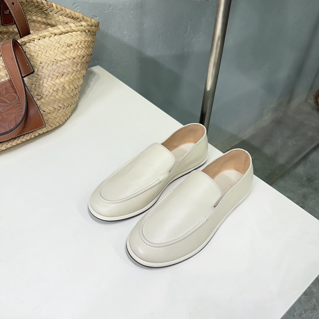 THE ROW 26S CLASSIC LOAFERS IN IVORY WHITE CALFSKIN