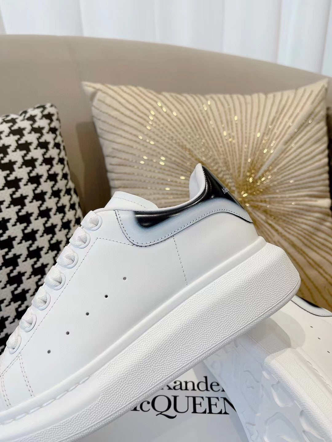 OVERSIZED SNEAKER IN WHITE CALFSKIN WITH GLOSSY BLACK AND WHITE HEEL TAB