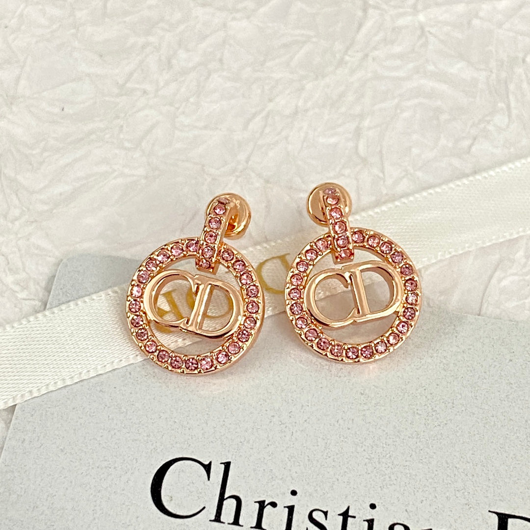 CD 26S CRYSTAL CIRCLE LOGO DROP EARRINGS IN ROSE GOLD TONE METAL 644468