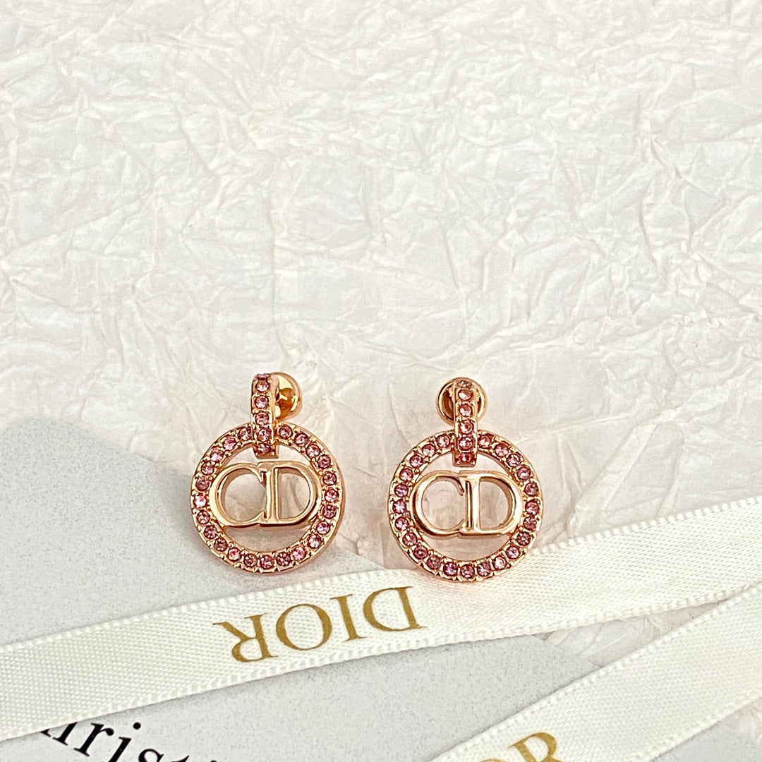 CD 26S CRYSTAL CIRCLE LOGO DROP EARRINGS IN ROSE GOLD TONE METAL 644468