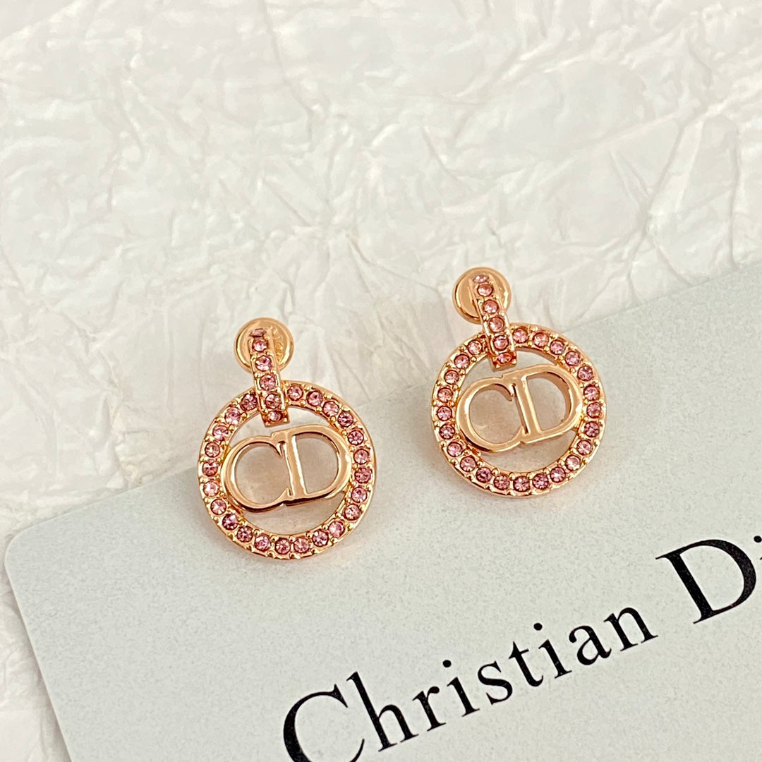 CD 26S CRYSTAL CIRCLE LOGO DROP EARRINGS IN ROSE GOLD TONE METAL 644468