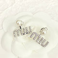 MIUMIU 26S PEARL LOGO DROP EARRINGS WITH CRYSTALS IN SILVER TONE METAL 625655