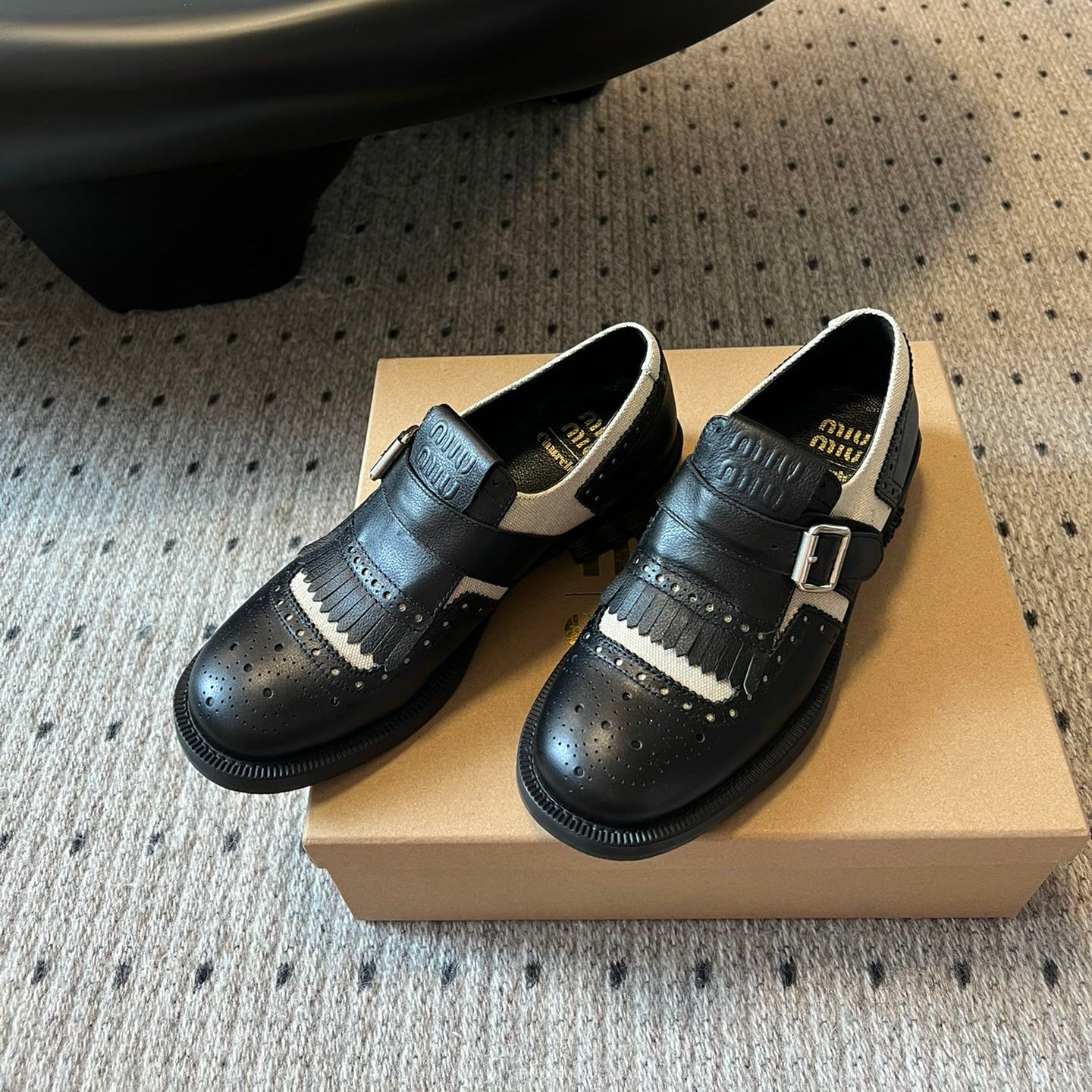 MIUMIU 26S FRINGE BUCKLE LOAFERS IN BLACK CALFSKIN