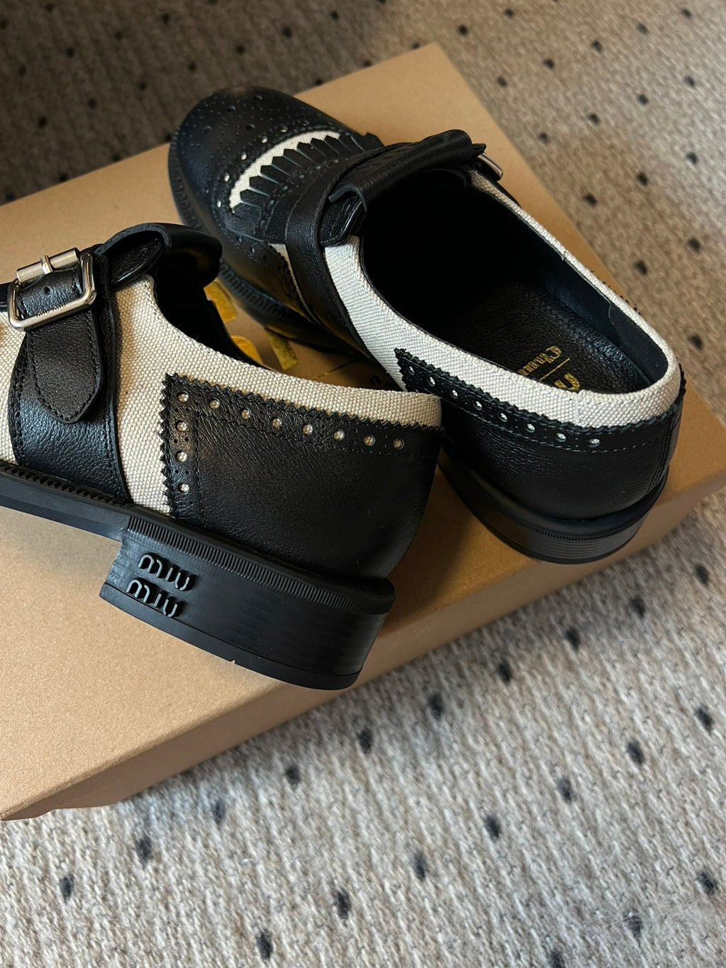 MIUMIU 26S FRINGE BUCKLE LOAFERS IN BLACK CALFSKIN
