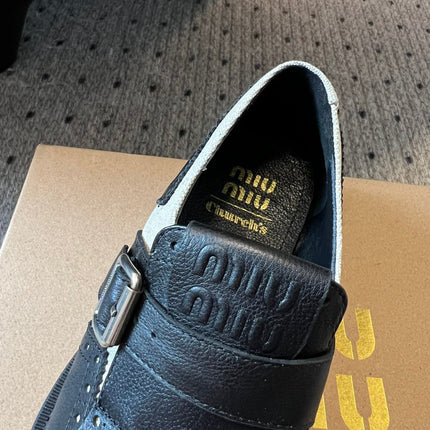 MIUMIU 26S FRINGE BUCKLE LOAFERS IN BLACK CALFSKIN